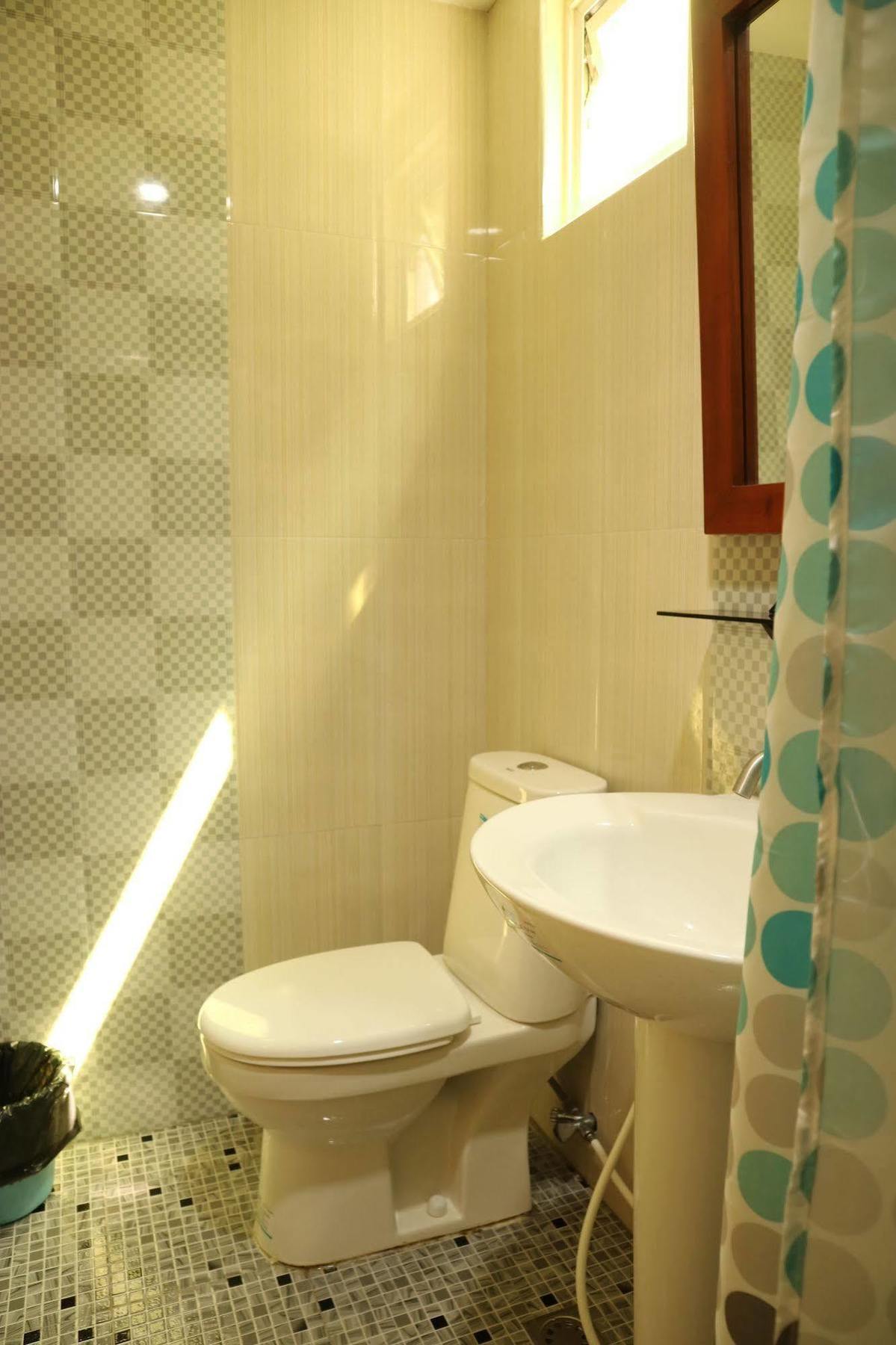 Ea Apartelle - Metro วีกัน ภายนอก รูปภาพ